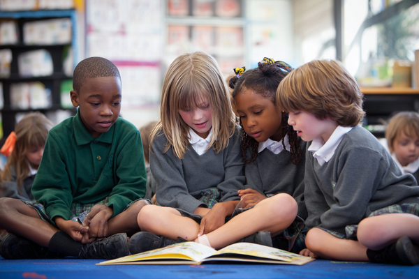 Closing the Early Literacy Gap: Tiered Reading Stations and Family Engagement